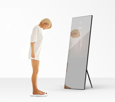 Balance de graisse corporelle dans le miroir de fitness intelligent Fitbathmirror